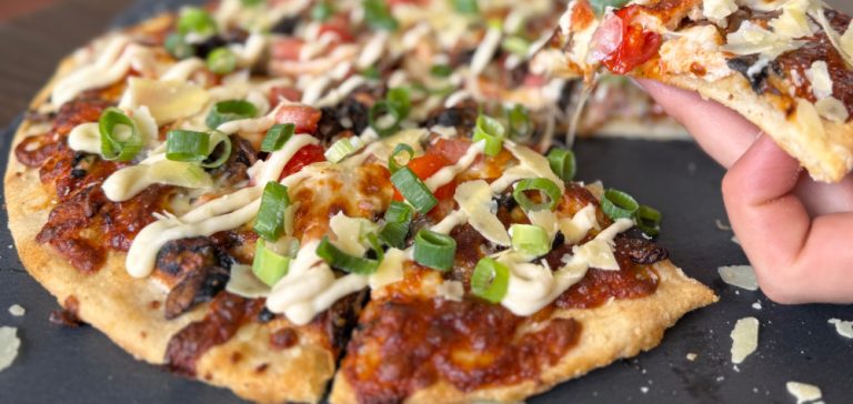 pizza with slice lifted